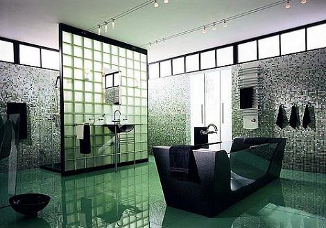 Baño moderno con azulejos verdes y mobiliario elegante.